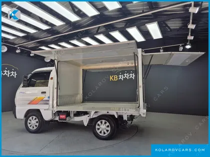 CHEVROLET (GM DAEWOO) RABO JACKKNIFED LONG CARGO