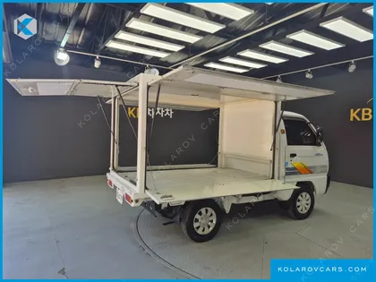 CHEVROLET (GM DAEWOO) RABO JACKKNIFED LONG CARGO